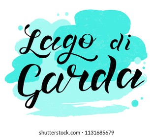 Hand lettering black text Lago di garda on white background with turquoise spots. Lake inf Italy. Modern calligraphy vector Illustration. Print for logo, travel, map, catalog, poster, blog, banner. svg