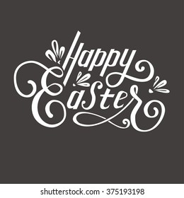 Hand lettering "Happy Easter". White letters on black background.
