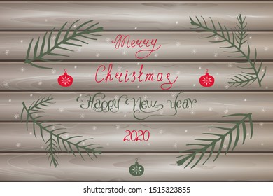 Hand lettering Happy New Year 2020, Merry Christmas on a light wooden background with fir branches and snowflakes.