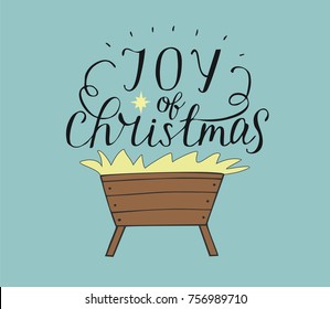 Hand lettering Joy of christmas with manger. Biblical background. Christian poster. Modern calligraphy Card Holiday