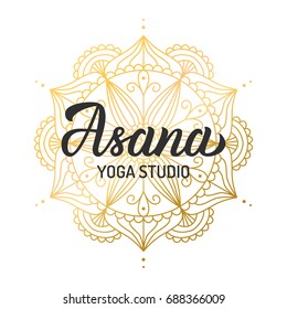 Hand lettering logo for yoga studio. Gilding mandala elements. Vector illustration.