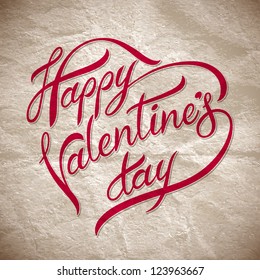 Hand lettering on the background of old paper texture ??happy valentine's day