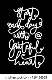 Hand Lettering Start Each Day With a Grateful Heart on Black Background. Modern Calligraphy. Handwritten Motivational Inspirational Quote.