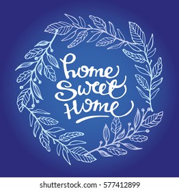 Hand lettering typography poster.Calligraphic quote 'Home sweet home' with floral decor.For housewarming posters, greeting cards, home decorations.Vector illustration.