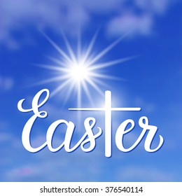 Hand lettering word "Easter" on blurred background. Vector illustration