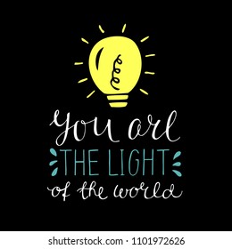 Hand lettering You are the light of the world, made with glowing light bulb. Biblical background. Christian poster.Modern calligraphy. Quote. Scripture print. Verse