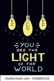 Hand lettering You are the light of the world, made with 3 glowing light bulbs. Biblical background. Christian poster.Modern calligraphy. Motivational quote. Scripture print. Verse