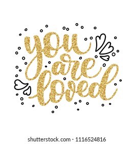 Hand lettering you are loved, black ink and gold glitter effect, custom writing isolated on white background. Modern calligraphy, can be used for Valentine's day card design.