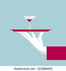 Hand lifting tray, cocktail in the tray.