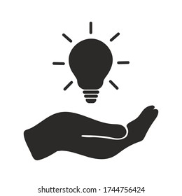 Hand with a Light bulb icon. Concept of ideias. Isolated vector