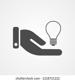 Hand with light bulb vector icon sign symbol