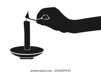 Hand lights candle. A person is lighting candle with fire match silhouette for holiday, relaxation, spa and more