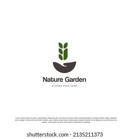 hand logo nature garden vector