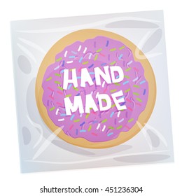 Hand made Frosted sugar Italian Freshly baked cookie in transparent plastic package with violet frosting and colorful sprinkles. Bright colors on white background. Vector illustration