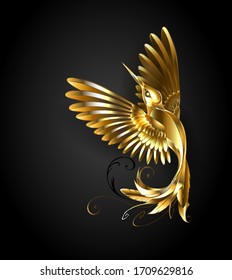 Hand Made Painter Golden Hummingbird On Black Background. Gold Bird.