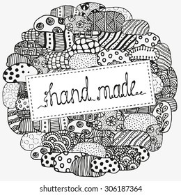 "Hand made" text. Circle stone ornament. Hand drawn.  Made by trace from sketch. Ink pen. Black and white background. Zentangle patters.