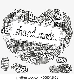 "Hand made" text. Heart stone ornament. Hand drawn.  Made by trace from sketch. Ink pen. Black and white background. Zentangle patters.