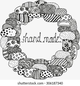 "Hand made" text. wreath.  Circle stone ornament. Hand drawn.  Made by trace from sketch. Ink pen. Black and white background. Zentangle patters.