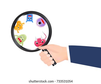 hand with magnifying glass found mini monster