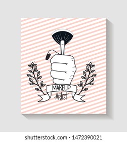 hand with make up brush accessory in floral frame