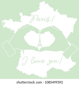 Hand making a heart shape. Tower, symbol of Paris. The inscription Paris I love you. Travel and leisure.
