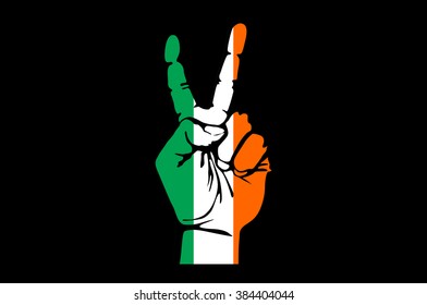 Hand making the V sign, Ireland flag painted as symbol of victory, win, success - isolated on black background art