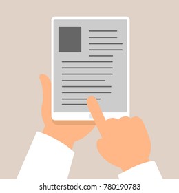 hand of man is holding tablet to read text on the tablet