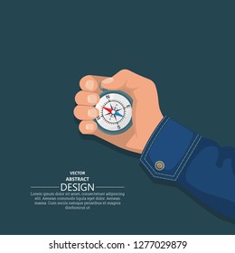 The hand of the man holds a compass. Device of orientation to areas. Concept of travel and tourism. An element for design. A vector illustration in flat style.