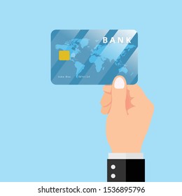 hand man woman holding credit card bank card with world map