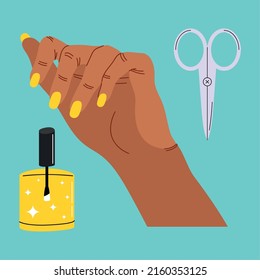 mano con iconos del equipo de manicura