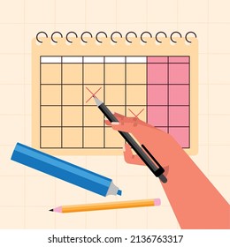 hand marking calendar with marker