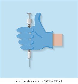 hand in a medical glove and syringe 