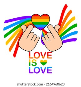 Hand mini heart and heart rainbow on hand. The left side has a ring on the ring finger.lgbtq vector and illustration.