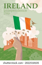 Hand with the national flag of Ireland on the background of the castle rock Cashel. Happy Independence Day.