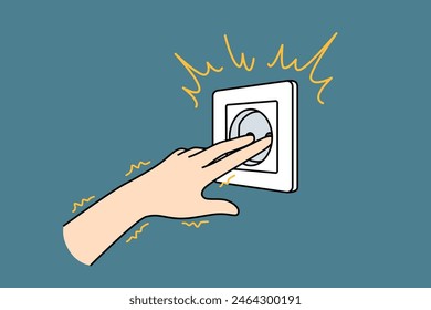 Hand near electrical outlet produces electric shock when touched due to violation of safety regulations. Man sticks fingers into socket and gets electric shock becouse of stupidity and curiosity