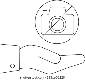A hand offering a gesture indicating no photography is allowed, featuring a camera icon with a line through it, symbolizing a photography ban.