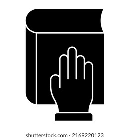 Hand on book denoting concept of oath