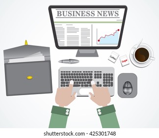 Hand on computer keyboard with business news on screen monitor, coffee and supplies