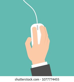 Hand on computer mouse