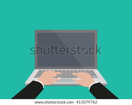 Hand on laptop keyboard with blank screen monitor