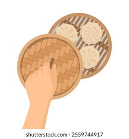 Hand opening a bamboo steaming basket and showing delicious baozi buns, isolated