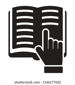 A hand over an opened book depicting book reading 