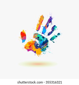 Hand of paint stains. Rainbow splash