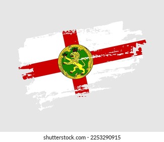 Hand painted Alderney grunge brush style flag on solid background