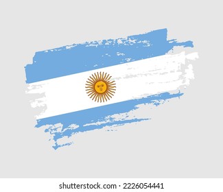 Hand painted Argentina grunge brush style flag on solid background