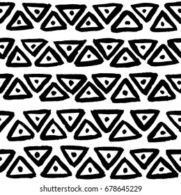 Hand painted black ink fish head triangles. Seamless vector pattern