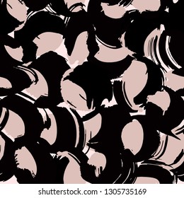 Hand painted brush strokes in white and pastel pink on black background. Seamless abstract repeating background