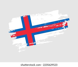 Hand painted Faroe Islands grunge brush style flag on solid background