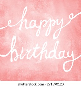 Hand painted Happy Birthday calligraphy script on decorative watercolor background