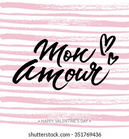 Hand painted love card with words 'Mon Amour'. Modern calligraphy design for wedding card or Valentine's day greeting card.